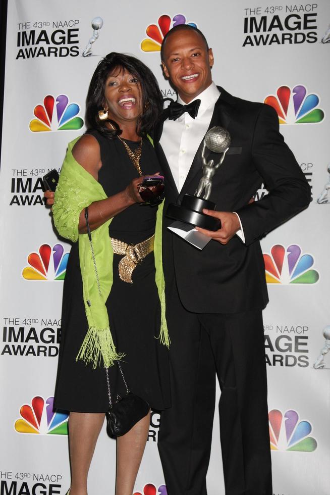 LOS ANGELES, FEB 17 - Emerson Brooks, with his Mothr Mary Brooks in the Press Room of the 43rd NAACP Image Awards at the Shrine Auditorium on February 17, 2012 in Los Angeles, CA photo