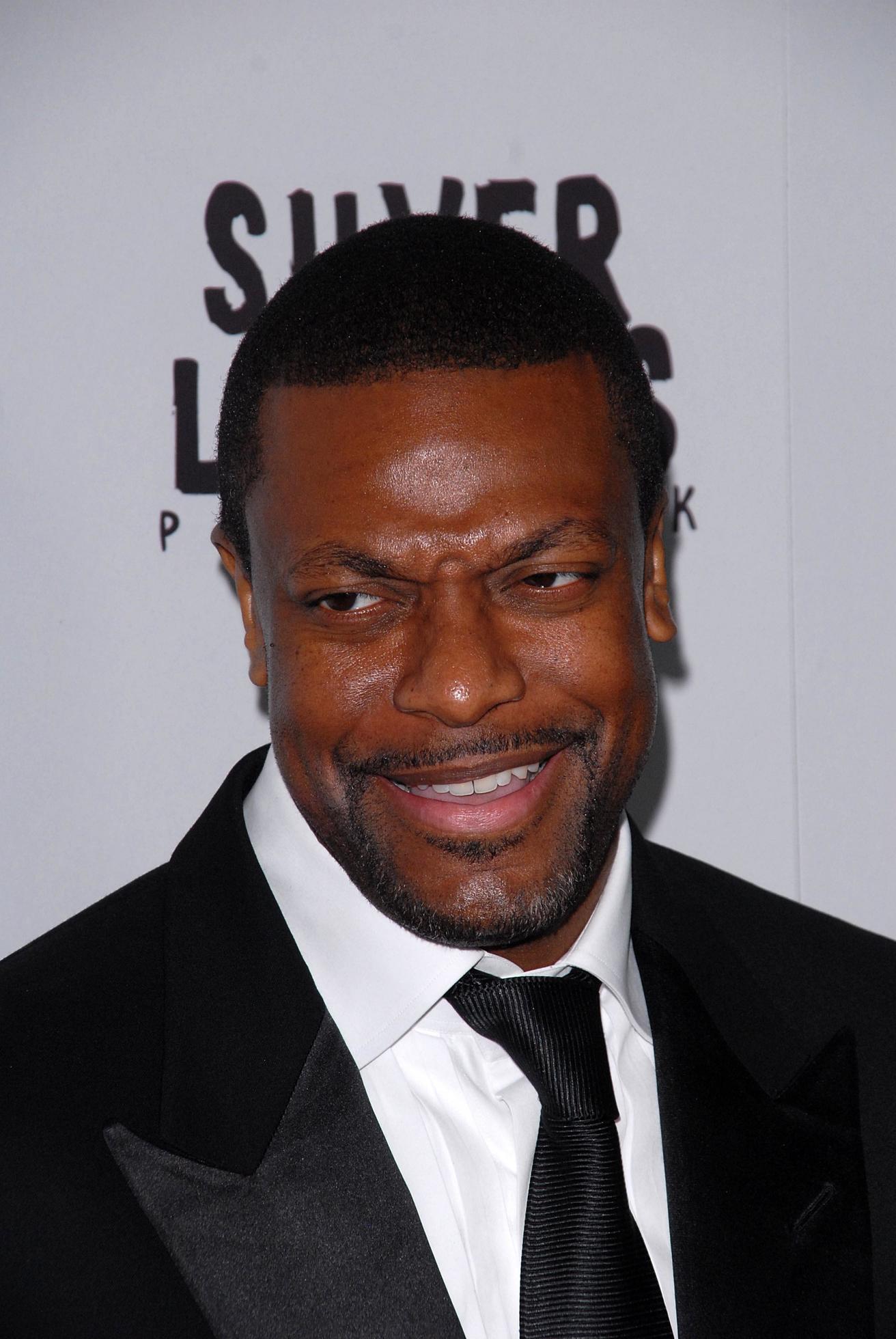 LOS ANGELES, NOV 19 - Chris Tucker arrives to the Silver Linings