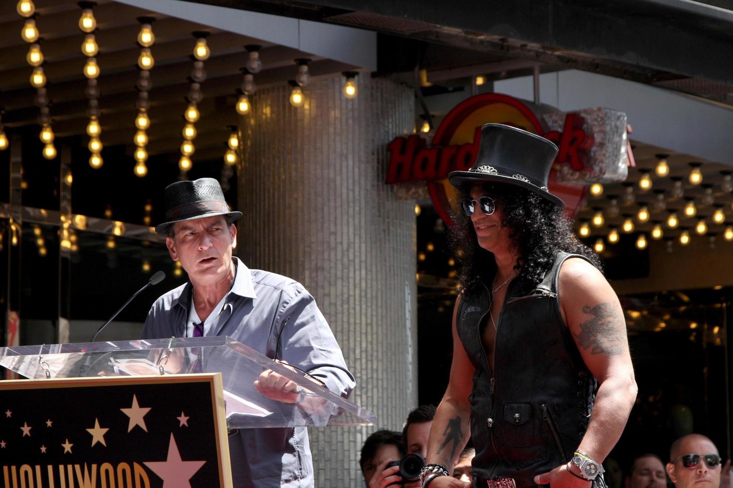 LOS ANGELES, JUL 9 - Charlie Sheen, Slash at the Hollywood Walk of Fame Ceremony for Slash at Hard Rock Cafe at Hollywood and Highland on July 9, 2012 in Los Angeles, CA photo