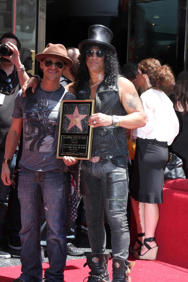 LOS ANGELES, JUL 9 - Clifton Collins Jr , Slash at the Hollywood Walk of Fame Ceremony for Slash at Hard Rock Cafe at Hollywood and Highland on July 9, 2012 in Los Angeles, CA photo