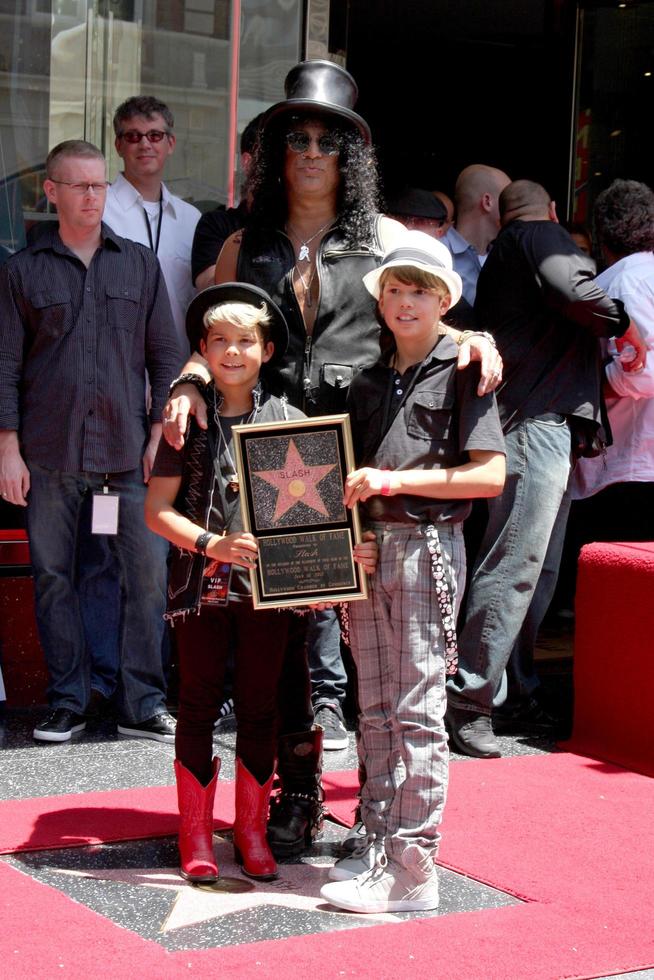 LOS ANGELES, JUL 9, Slash and two sons at the Hollywood Walk of Fame Ceremony for Slash at Hard Rock Cafe at Hollywood and Highland on July 9, 2012 in Los Angeles, CA photo