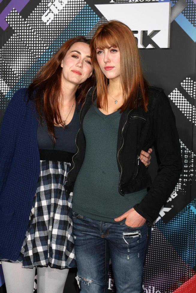 LOS ANGELES, APR 20 - Madeline Zima, Yvonne Zima arriving at the Launch Of The New T-Mobile Sidekick 4G at Old Robinson May Building on April 20, 2011 in Beverly Hills, CA photo