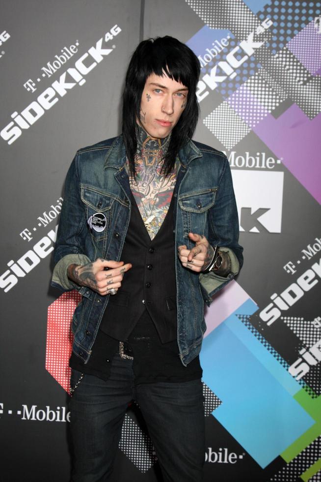 LOS ANGELES, APR 20 - Trace Cyrus arriving at the Launch Of The New T-Mobile Sidekick 4G at Old Robinson May Building on April 20, 2011 in Beverly Hills, CA photo