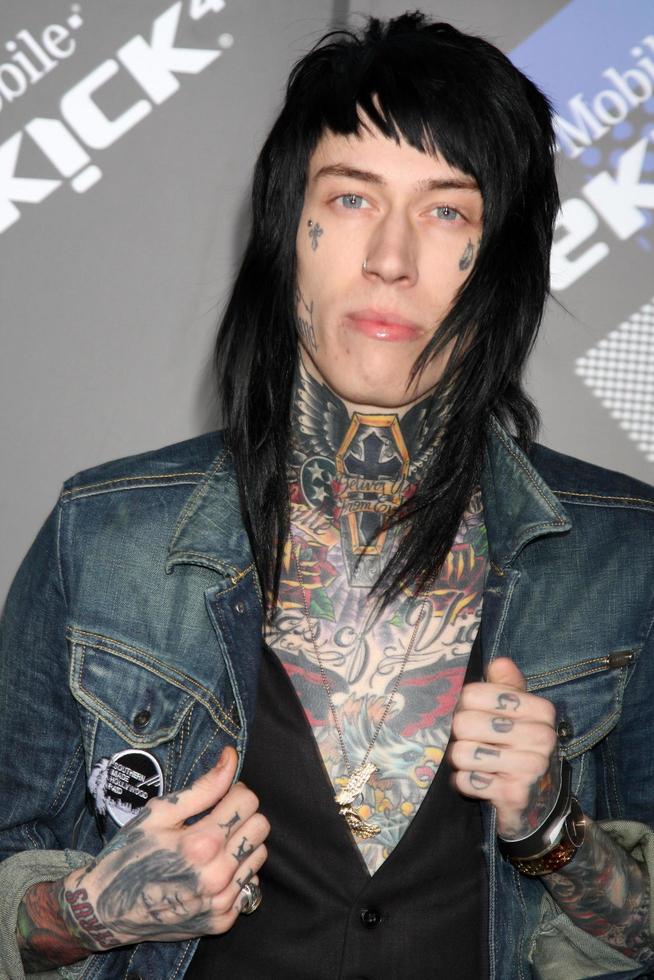 LOS ANGELES, APR 20 - Trace Cyrus arriving at the Launch Of The New T-Mobile Sidekick 4G at Old Robinson May Building on April 20, 2011 in Beverly Hills, CA photo