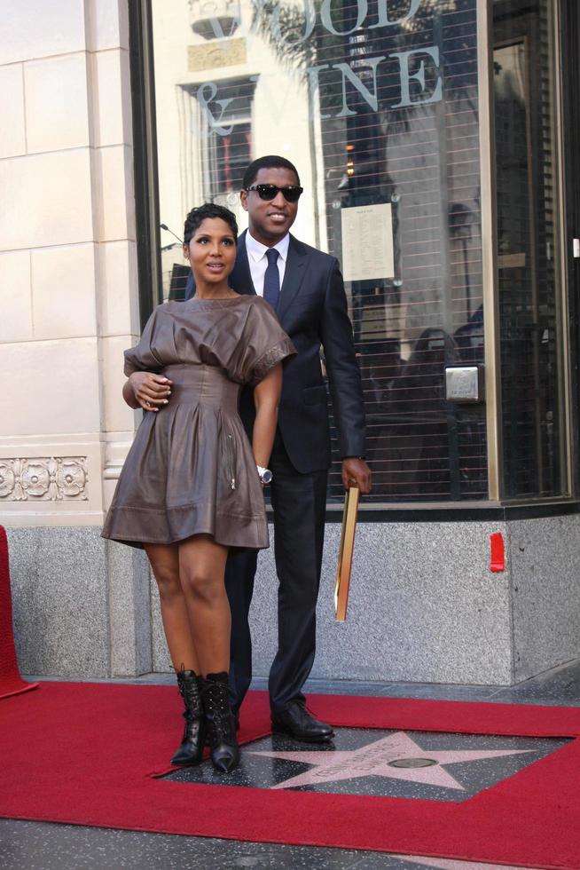 LOS ANGELES, OCT 10 - Toni Braxton, Kenny Babyface Edmonds at the Kenny Babyface Edmonds Hollywood Walk of Fame Star Ceremony at Hollywood Boulevard on October 10, 2013 in Los Angeles, CA photo