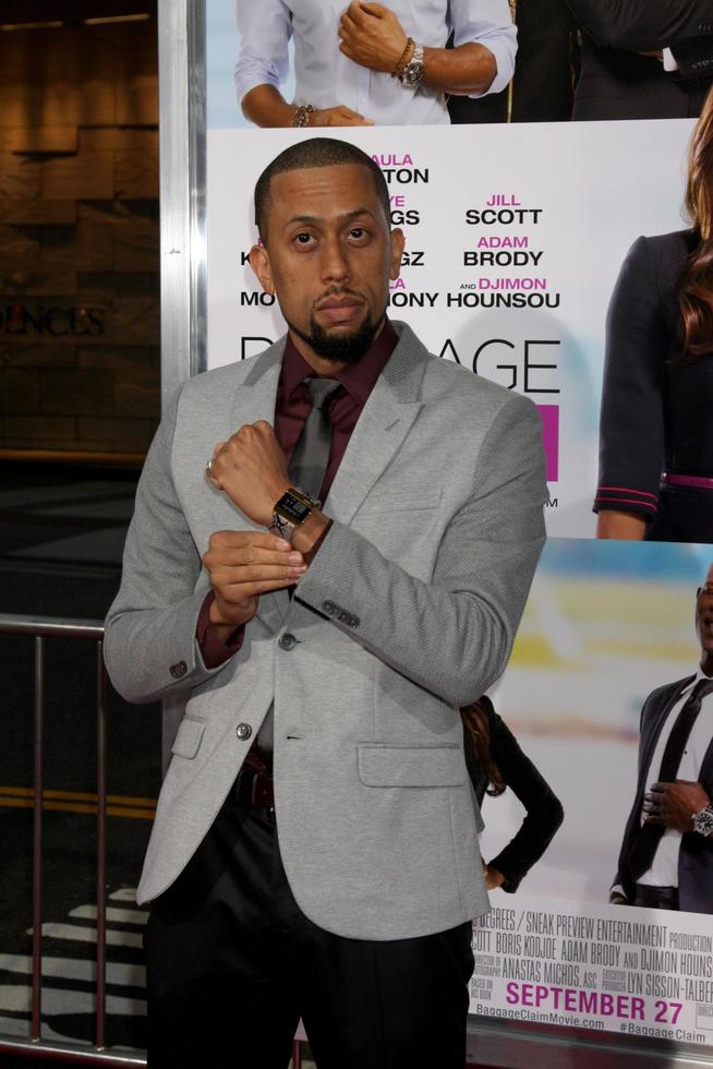 LOS ANGELES, SEP 25 - Tony Rock at the Baggage Clain Premiere at Regal 14 Theaters on September 25, 2013 in Los Angeles, CA photo