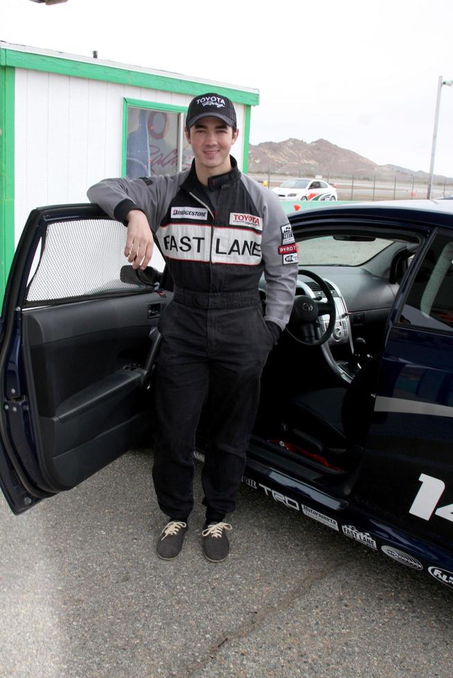 LOS ANGELES, MAR 19 - Kevin Jonas at the Toyota Pro Celebrity Race Training Session at Willow Springs Speedway on March 19, 2011 in Rosamond, CA photo