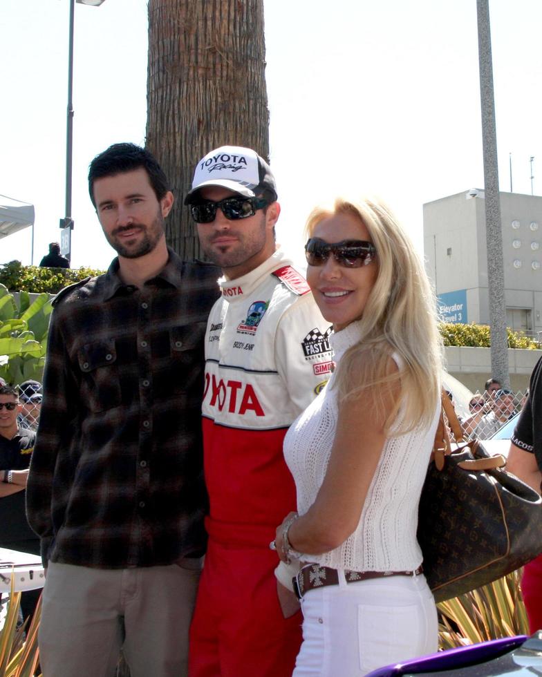 LOS ANGELES, APR 14 - Brother Brandon Jenner, Brody Jenner, mom Linda Thompson at the 2012 Toyota Pro Celeb Race at Long Beach Grand Prix on April 14, 2012 in Long Beach, CA photo