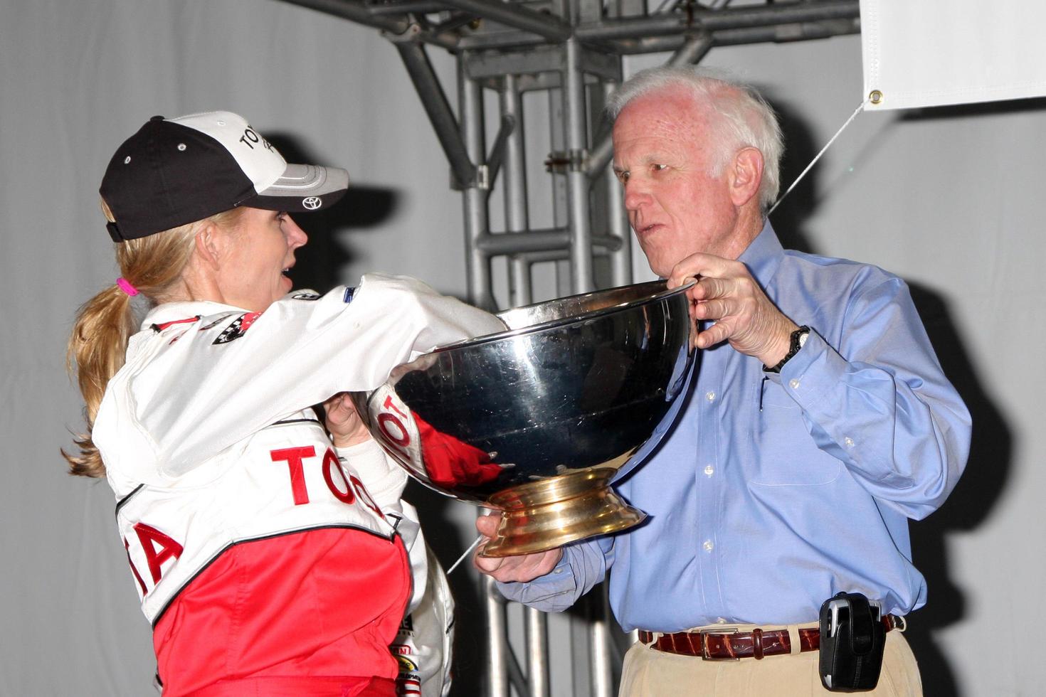 LOS ANGELES, APR 3 - Eileen Davidson, Les Unger at the 2012 Toyota Pro Celeb Race Press Day at Toyota Long Beach Grand Prix Track on April 3, 2012 in Long Beach, CA photo