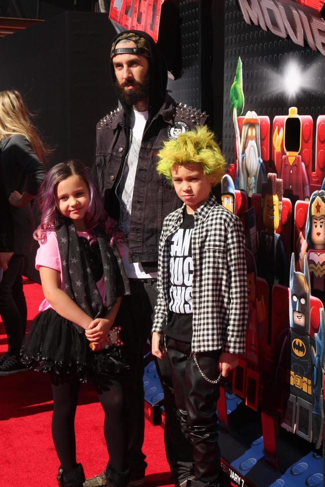 LOS ANGELES, FEB 1 - Travis Barker, children at the Lego Movie Premiere at Village Theater on February 1, 2014 in Westwood, CA photo