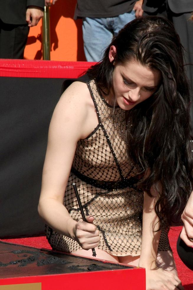 LOS ANGELES, NOV 3 - Kristen Stewart at the Handprint and Footprint Ceremony for the Twilight Saga Actors at Grauman s Chinese Theater on November 3, 2011 in Los Angeles, CA photo