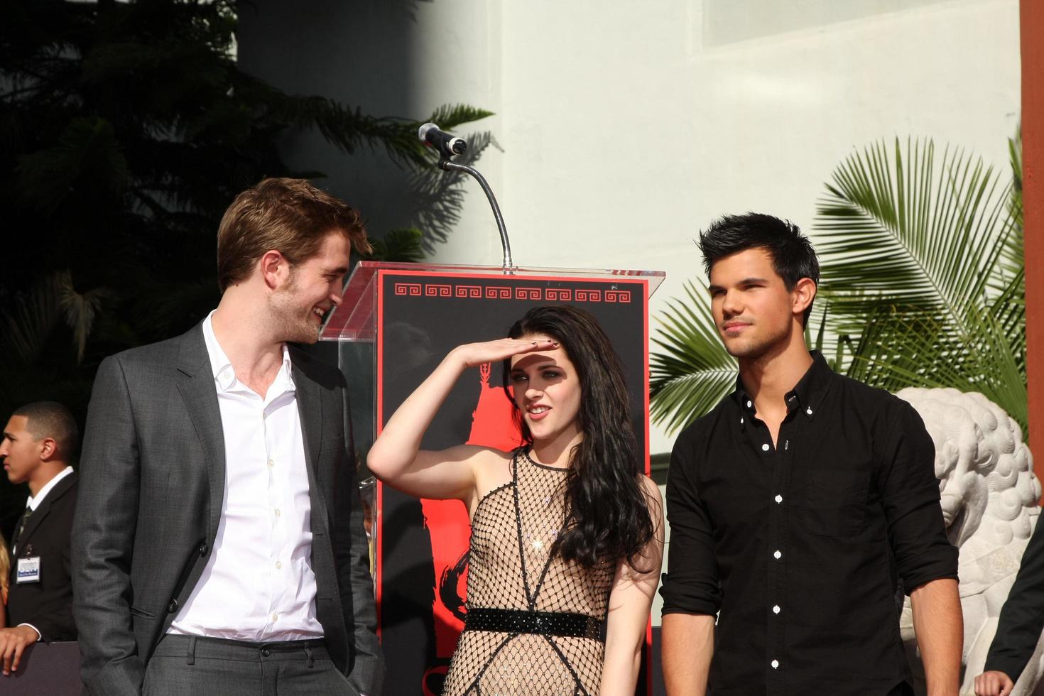 LOS ANGELES, NOV 3 - Robert Pattinson, Kristen Stewart, Taylor Lautner at the Handprint and Footprint Ceremony for the Twilight Saga Actors at Grauman s Chinese Theater on November 3, 2011 in Los Angeles, CA photo