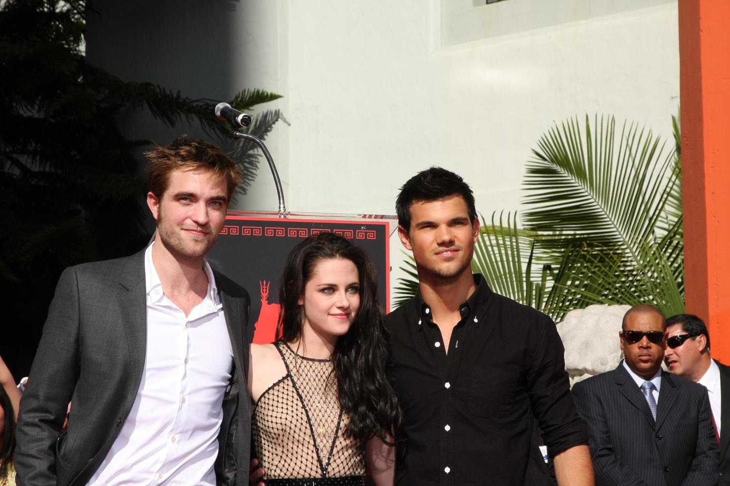 LOS ANGELES, NOV 3 - Robert Pattinson, Kristen Stewart, Taylor Lautner at the Handprint and Footprint Ceremony for the Twilight Saga Actors at Grauman s Chinese Theater on November 3, 2011 in Los Angeles, CA photo