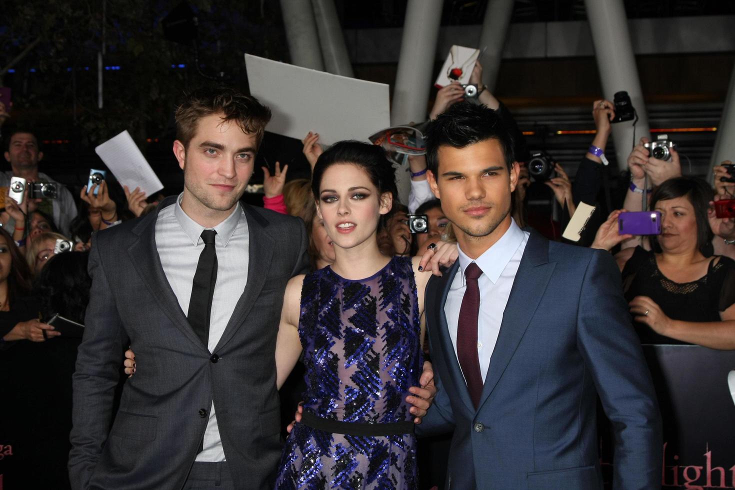 LOS ANGELES, NOV 14 - Robert Pattinson, Kristen Stewart, Taylor Lautner arrives at the Twilight - Breaking Dawn Part 1 World Premiere at Nokia Theater at LA LIve on November 14, 2011 in Los Angeles, CA photo