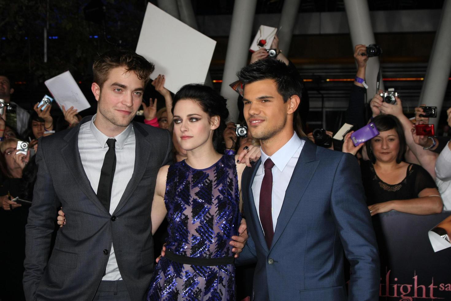 LOS ANGELES, NOV 14 - Robert Pattinson, Kristen Stewart, Taylor Lautner arrives at the Twilight - Breaking Dawn Part 1 World Premiere at Nokia Theater at LA LIve on November 14, 2011 in Los Angeles, CA photo