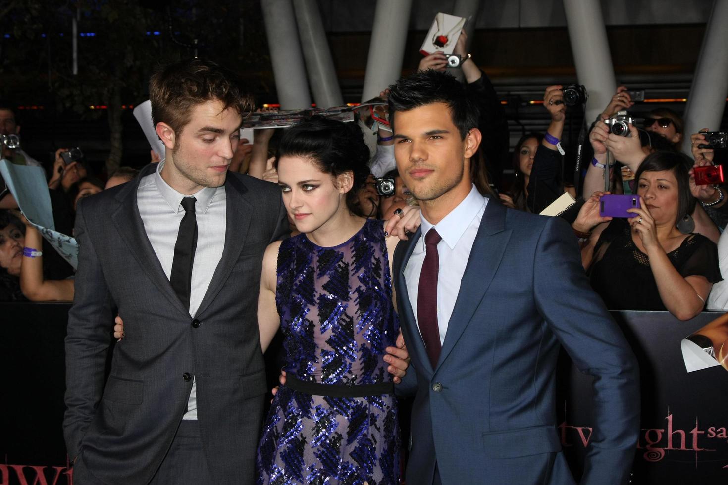 LOS ANGELES, NOV 14 - Robert Pattinson, Kristen Stewart, Taylor Lautner arrives at the Twilight - Breaking Dawn Part 1 World Premiere at Nokia Theater at LA LIve on November 14, 2011 in Los Angeles, CA photo