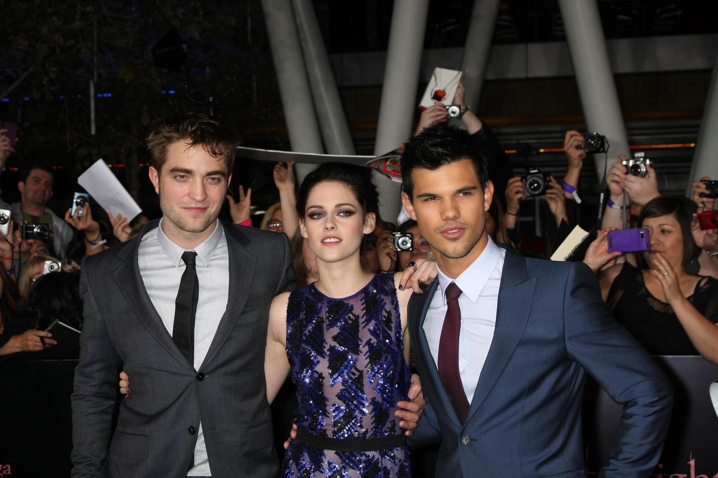 LOS ANGELES, NOV 14 - Robert Pattinson, Kristen Stewart, Taylor Lautner arrives at the Twilight - Breaking Dawn Part 1 World Premiere at Nokia Theater at LA LIve on November 14, 2011 in Los Angeles, CA photo