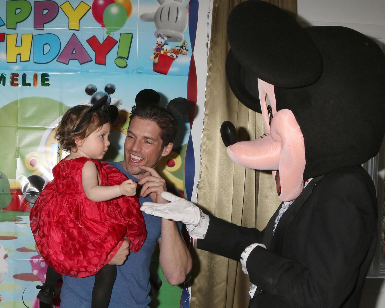 LOS ANGELES, DEC 4 - Amelie Bailey, Scott Bailey, Mickey Mouse character at the Amelie Bailey s 1st Birthday Party at Private Residence on December 4, 2016 in Studio CIty, CA photo