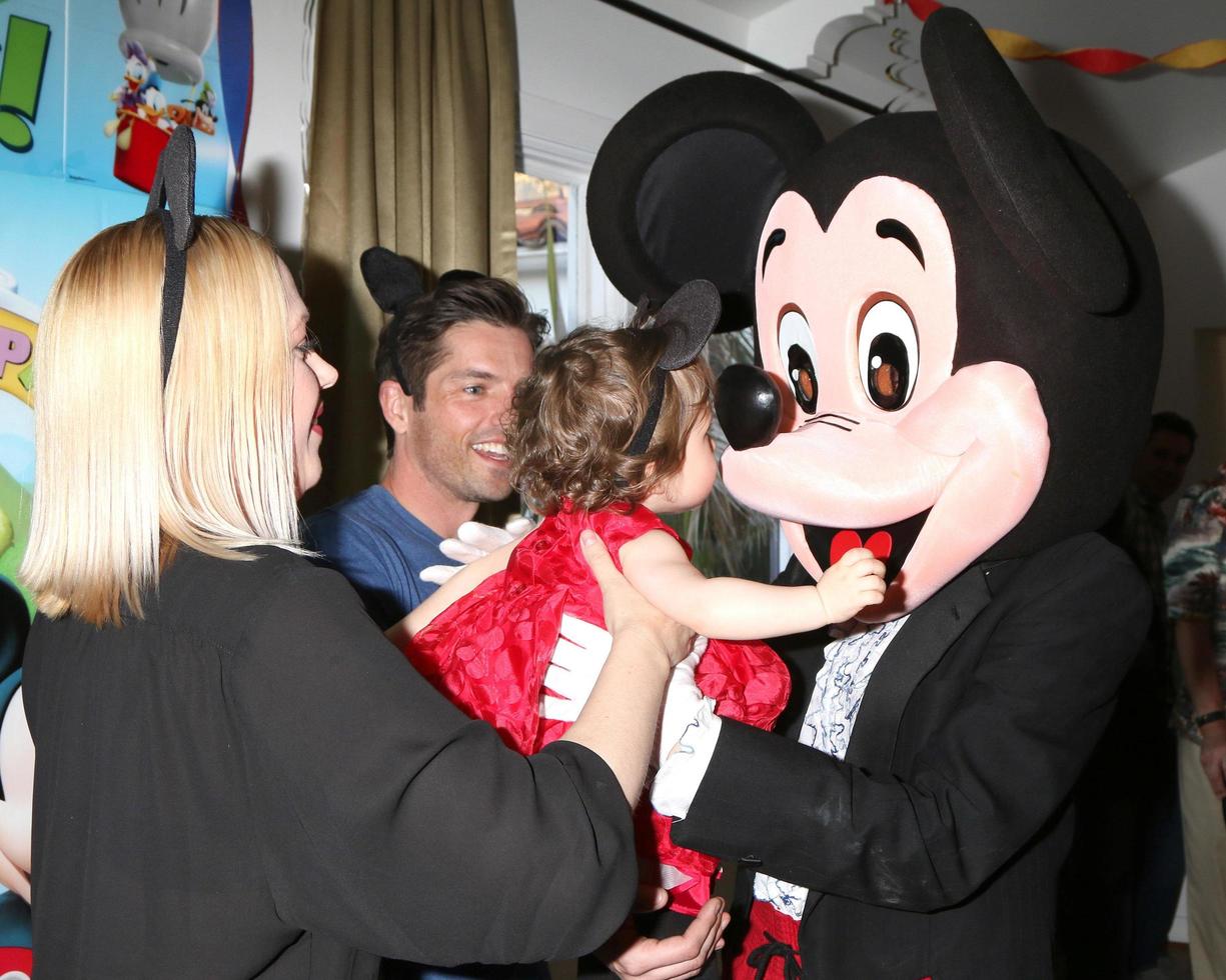 LOS ANGELES, DEC 4 - Adrienne Frantz Bailey, Amelie Bailey, Scott Bailey, Mickey Mouse character at the Amelie Bailey s 1st Birthday Party at Private Residence on December 4, 2016 in Studio CIty, CA photo