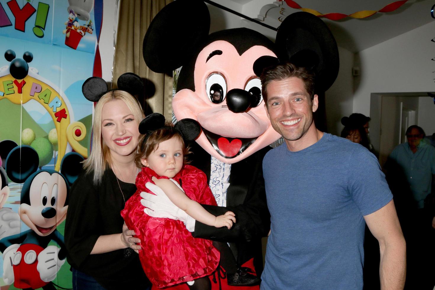 LOS ANGELES, DEC 4 - Adrienne Frantz Bailey, Amelie Bailey, Scott Bailey, Mickey Mouse character at the Amelie Bailey s 1st Birthday Party at Private Residence on December 4, 2016 in Studio CIty, CA photo