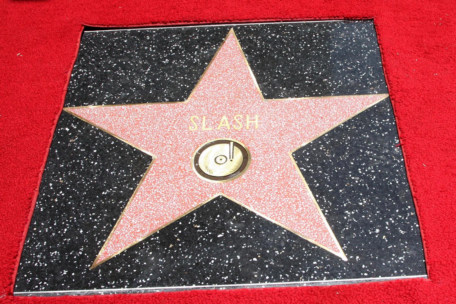 LOS ANGELES, JUL 9 - Slash Walk of Fame star at the Hollywood Walk of Fame Ceremony for Slash at Hard Rock Cafe at Hollywood and Highland on July 9, 2012 in Los Angeles, CA photo