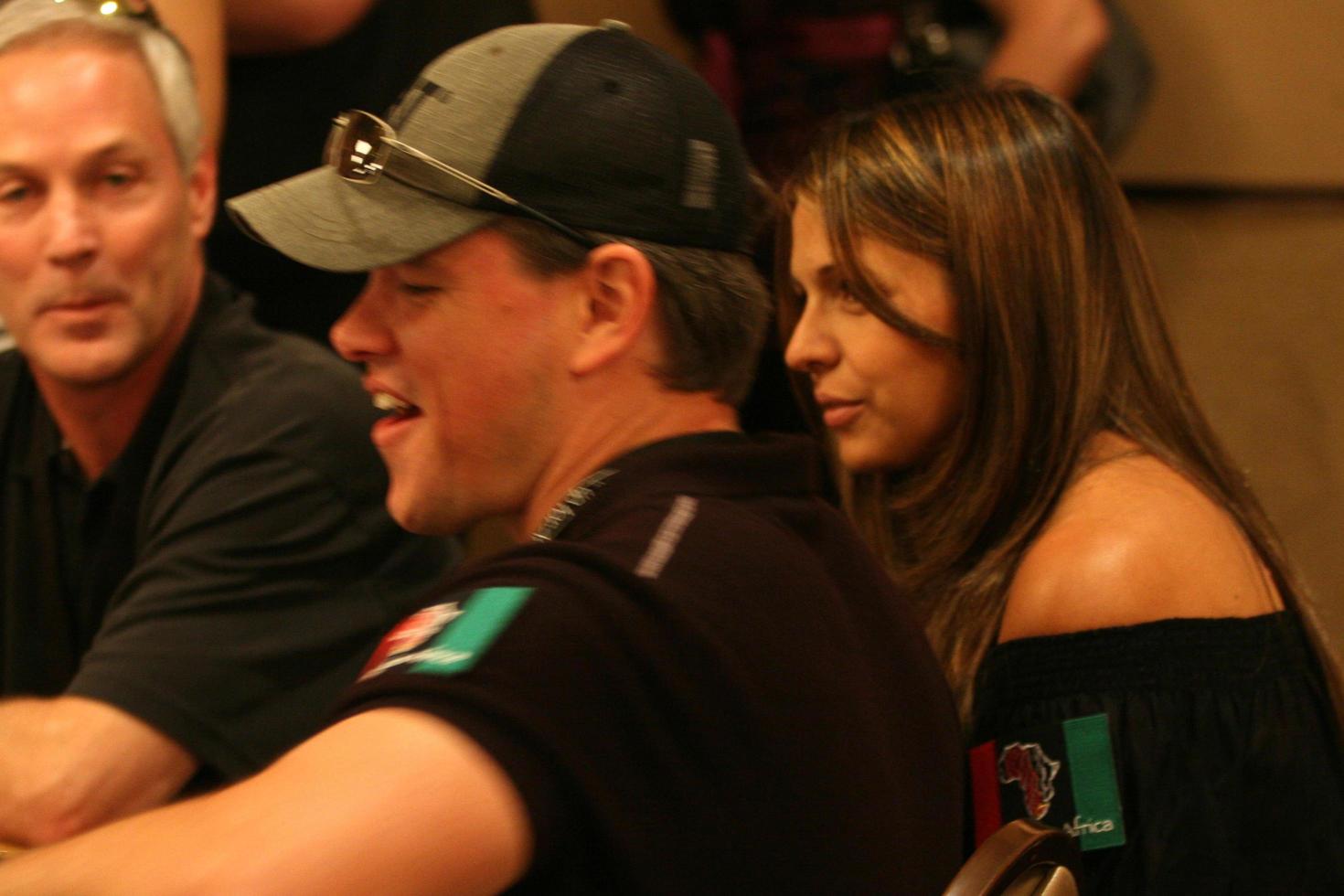 Matt Damon playing poker as his wife looks on at the Ante up for Africa Poker Tournament at the 2008 World Series of Poker, at the Rio All-Suite Hotel and Casino in
Las Vegas, NV
July 2, 2008
 2008 Kathy Hutchins Hutchins Photo