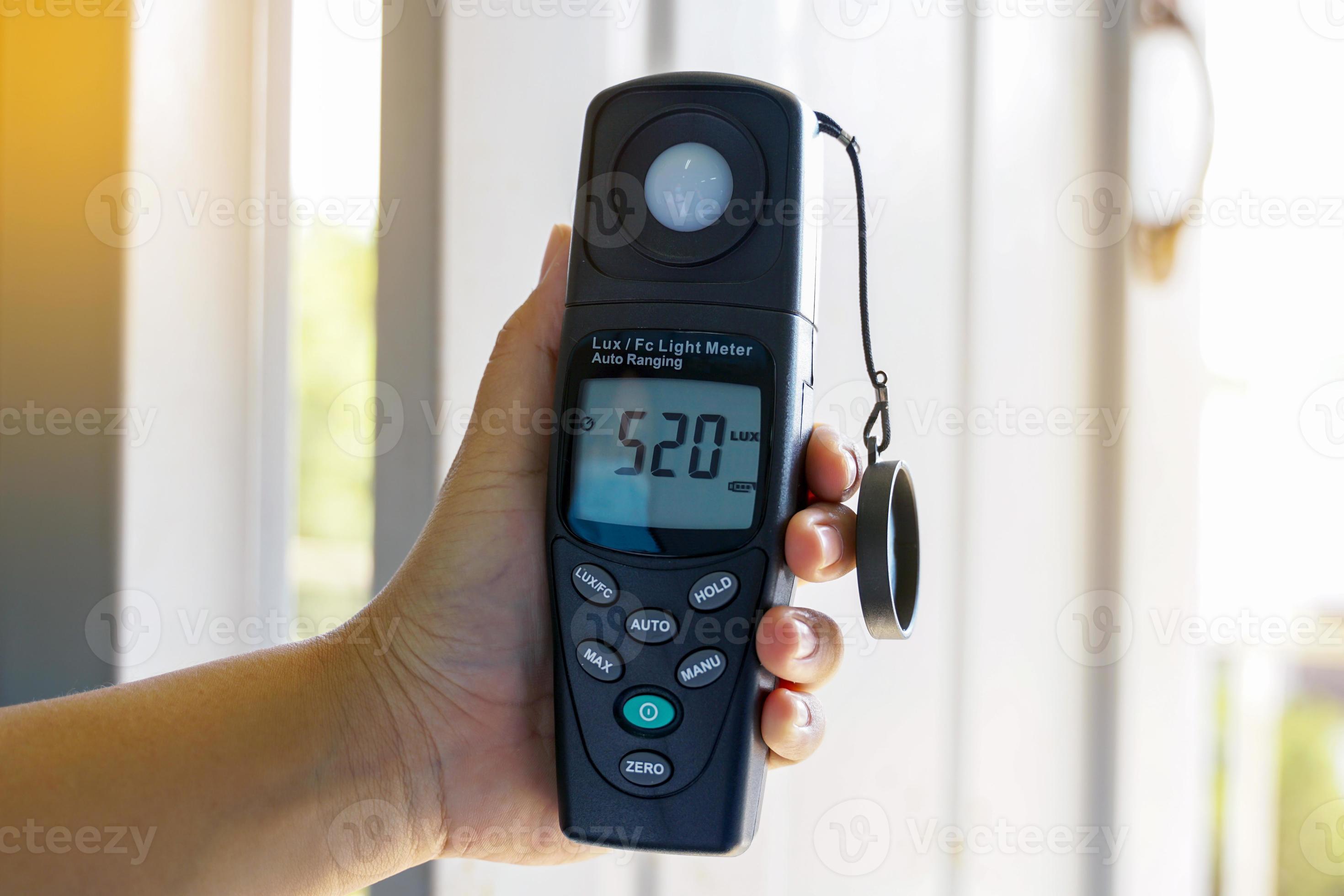 Light meter, Lux Light Meter hold in hand to measure the brightness of