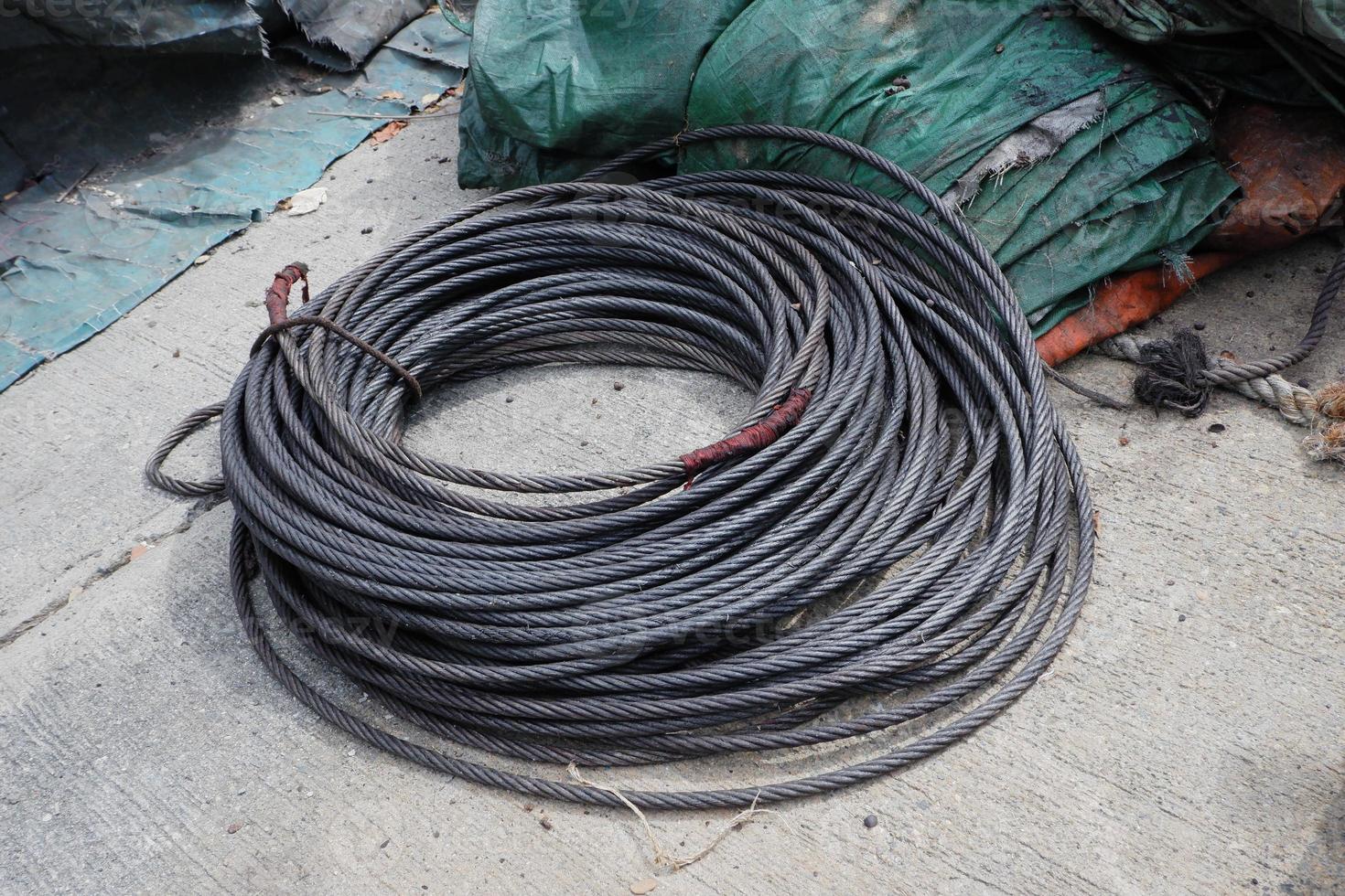 Large wire rope sling reel. Steel wire rope or cable for heavy industrial use, Selective Focus. photo