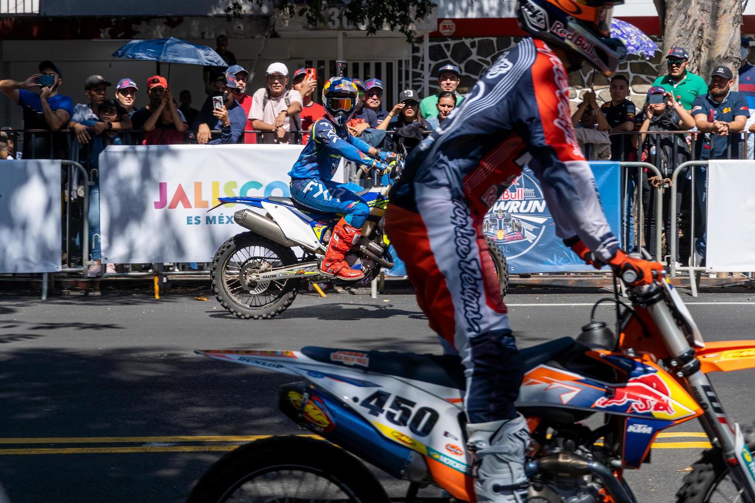 GUADALAJARA, MEXICO - OCTOBER 25 2022 Showrun Aaron Colton, Didier Goirand and ivan Ramirez riding motorcycles photo