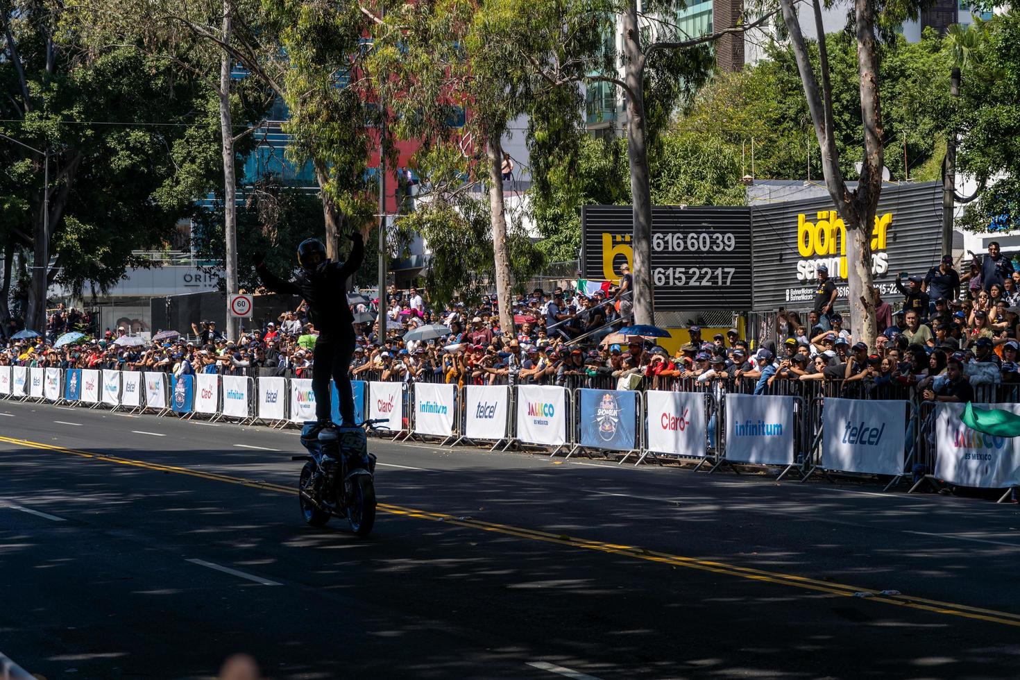 GUADALAJARA, MEXICO - OCTOBER 25 2022 Showrun Aaron Colton, Didier Goirand and ivan Ramirez riding motorcycles photo