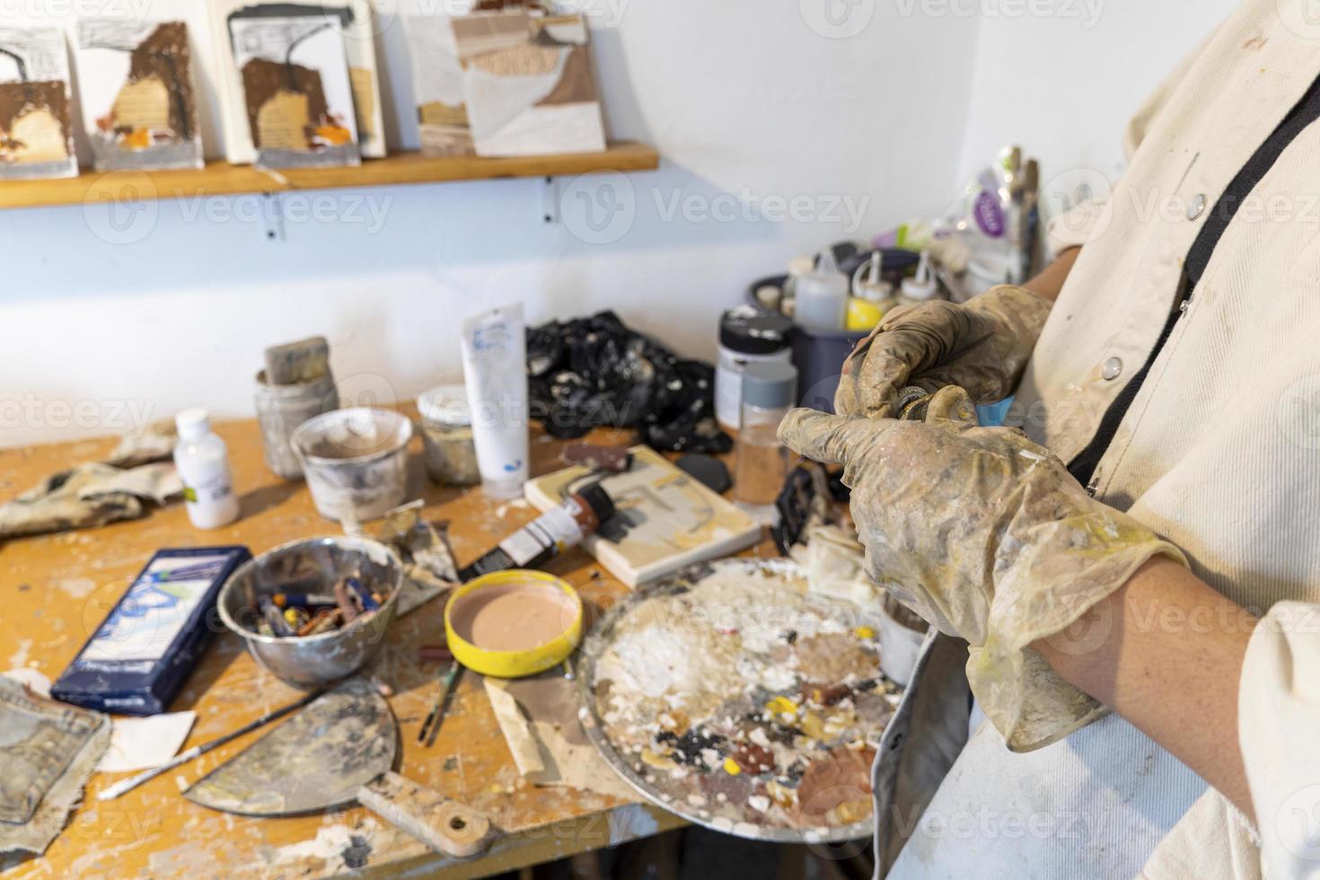 studio or work space of a hispanic woman artist, oil painting, mexico photo