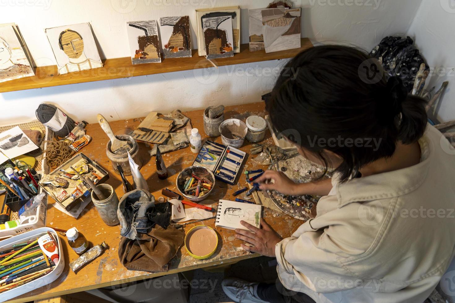 studio or work space of a hispanic woman artist, oil painting, mexico photo