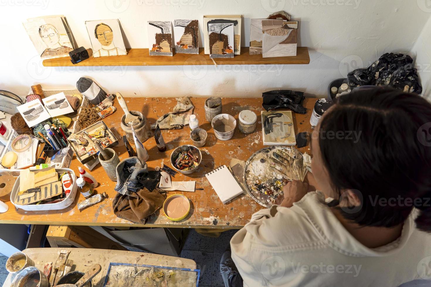 studio or work space of a hispanic woman artist, oil painting, mexico photo