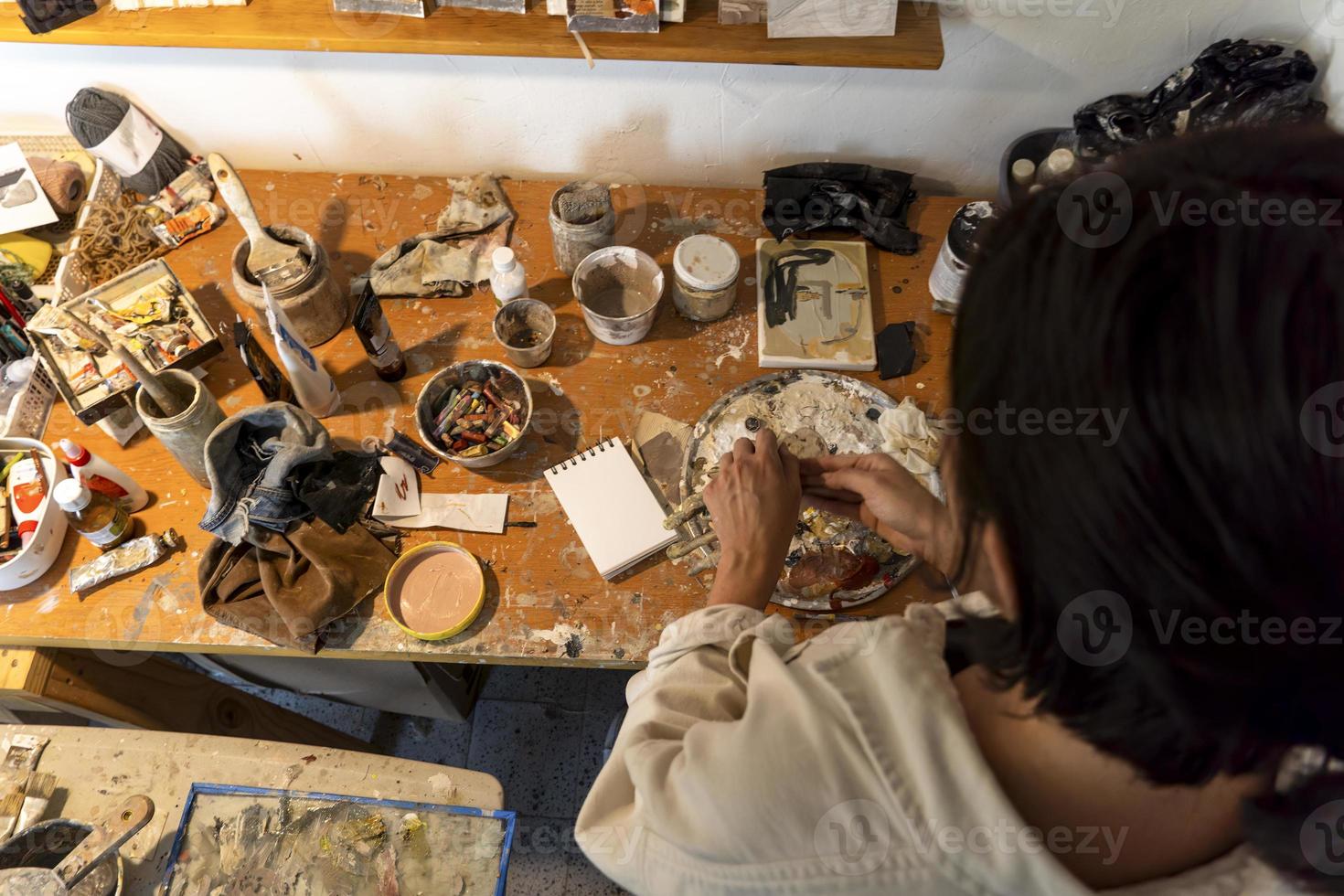 studio or work space of a hispanic woman artist, oil painting, mexico photo