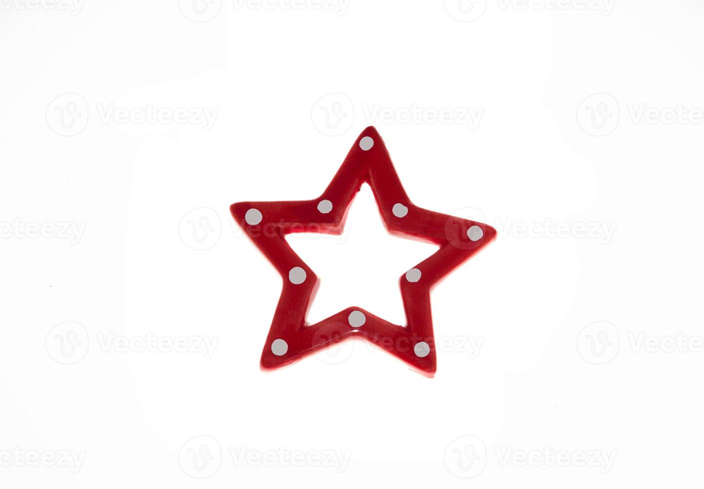 Beautiful red star a new year toy isolated on white photo