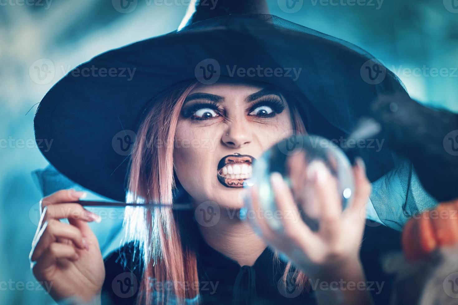 Witch Watching The Future In Magic Ball photo