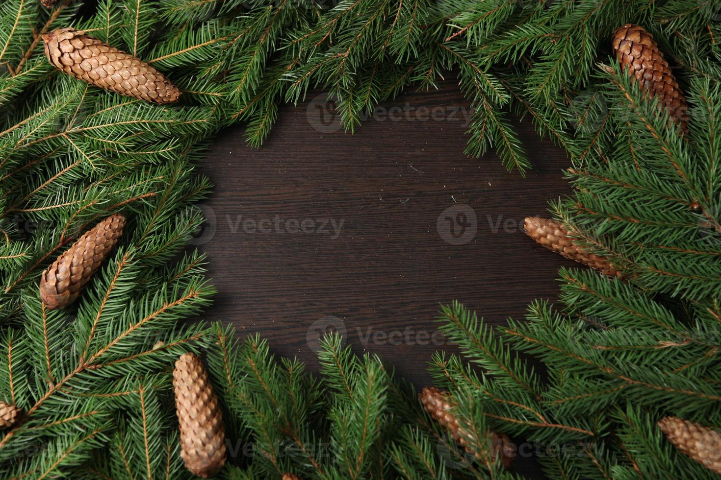 Holidays greeting card or banner composition with pine tree branches. Merry Christmas background and Happy New Year 2023. photo