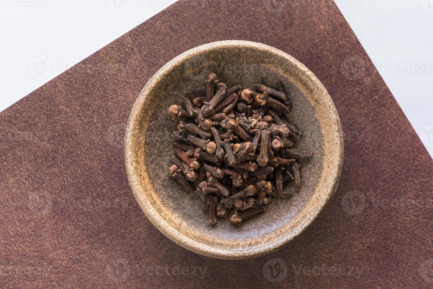 Whole Cloves Spice in a Bowl photo