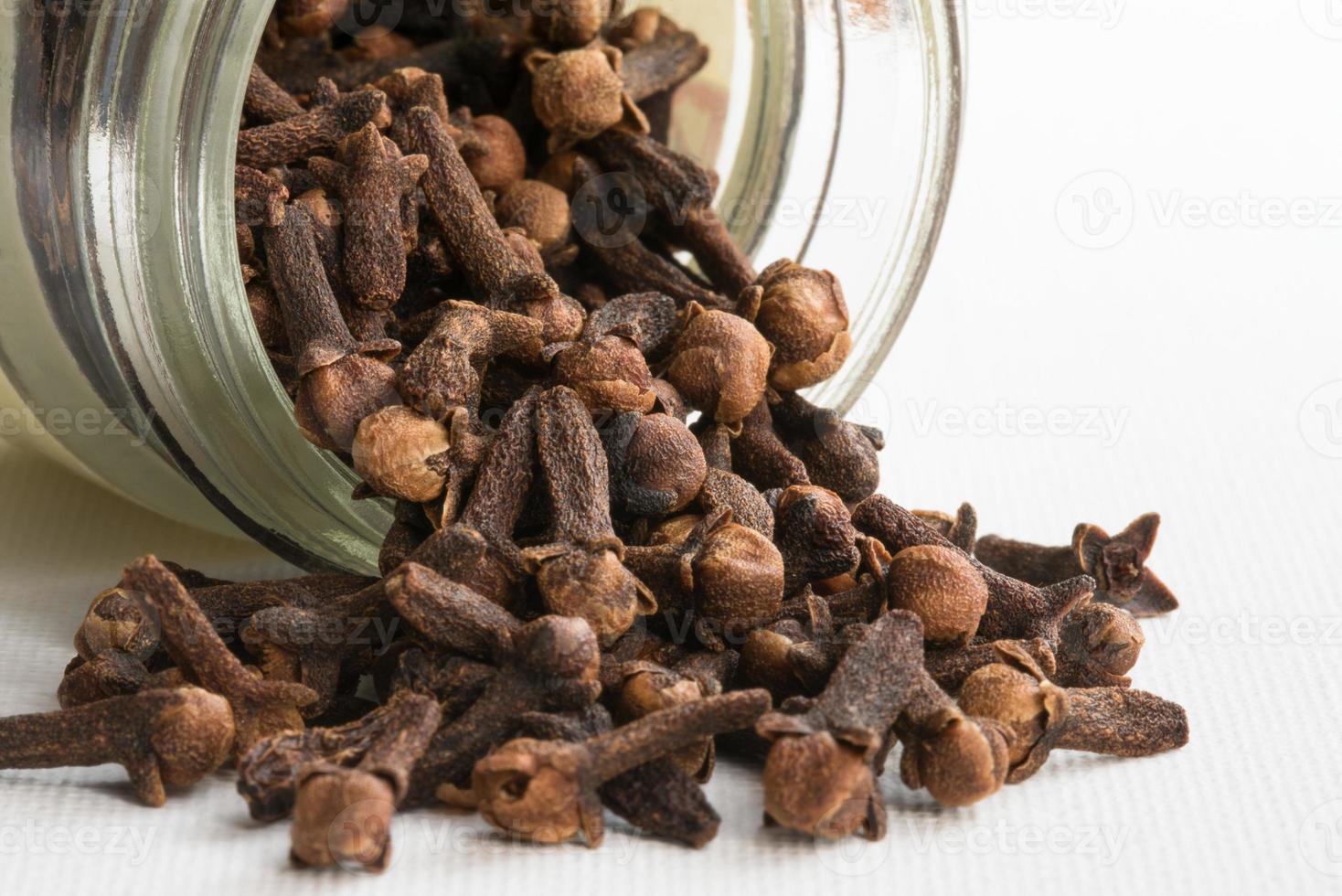 Whole Cloves Spice Spilled from a Jar 14145045 Stock Photo at Vecteezy