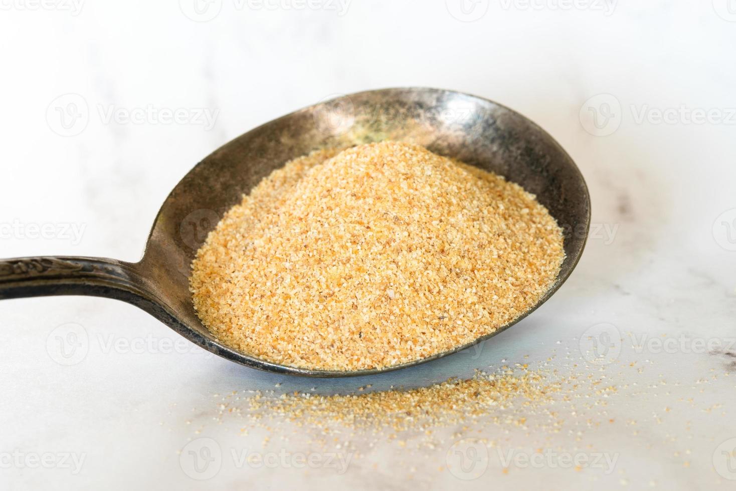 Garlic Powder on a Spoon photo