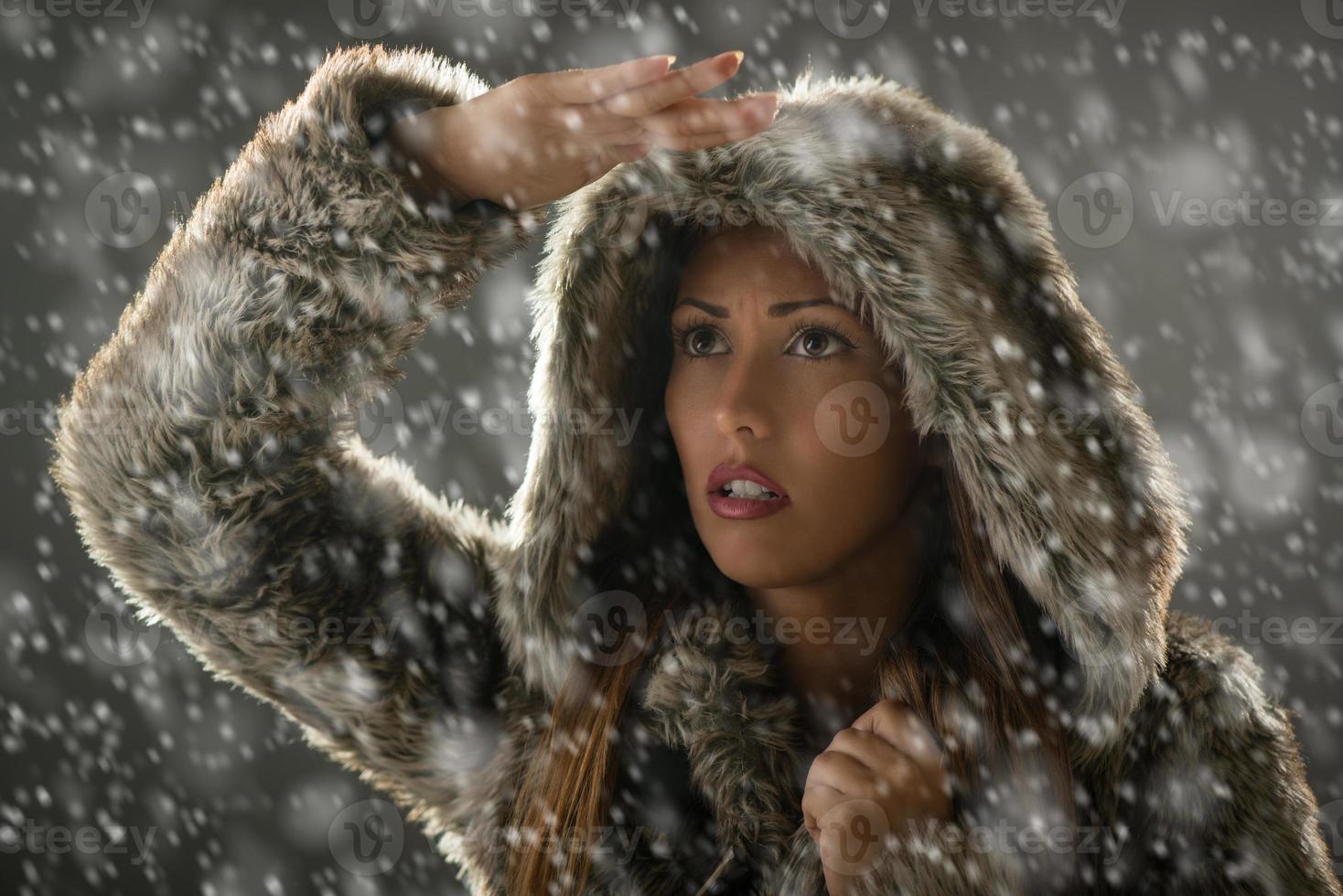 Girl Finding Her Way Through Blizzard photo