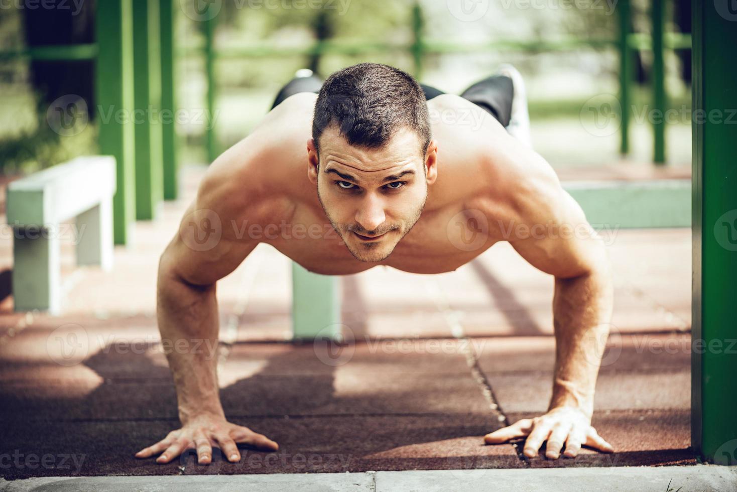 Young Man Exercising In Nature photo