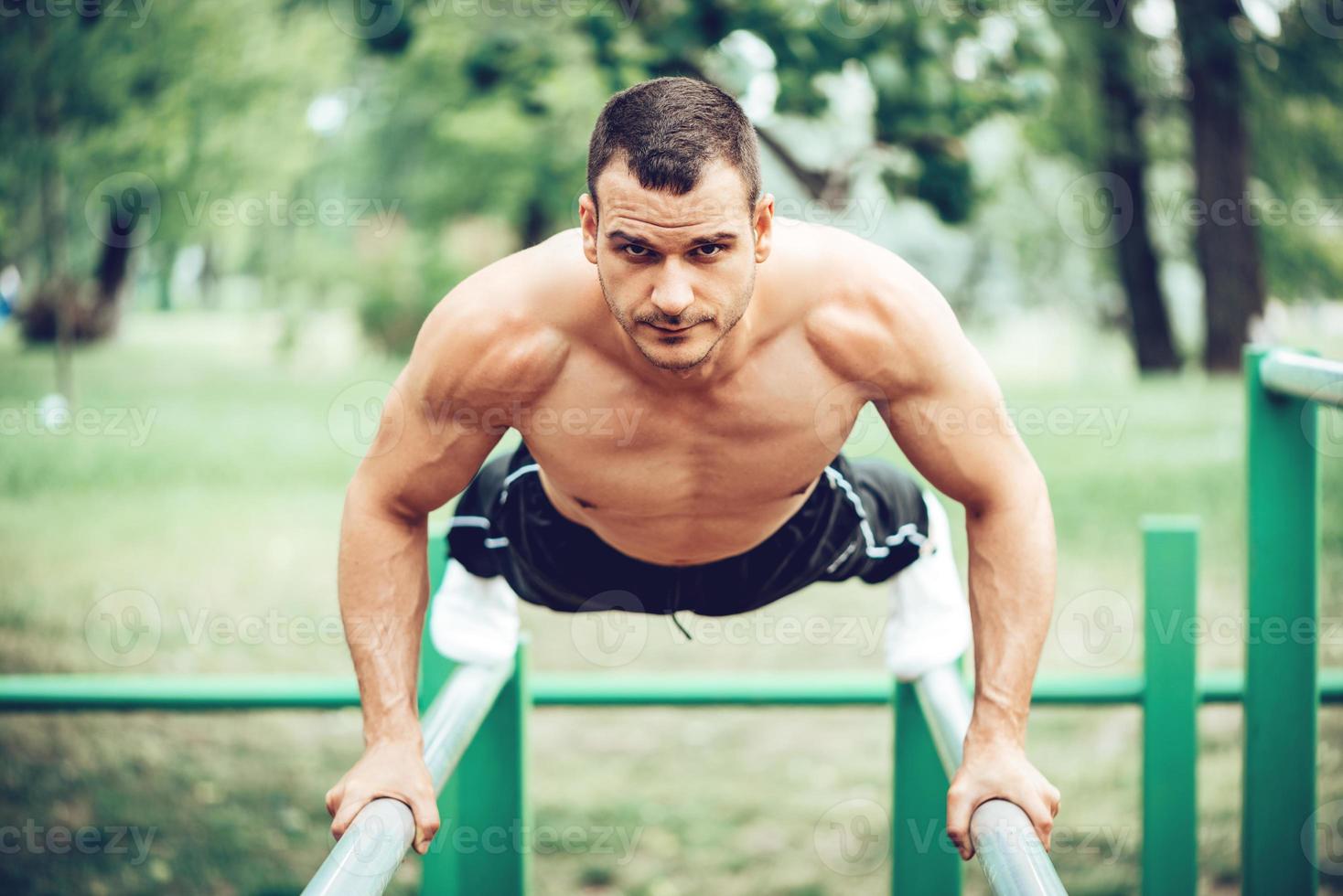 Young Man Exercising In Nature photo