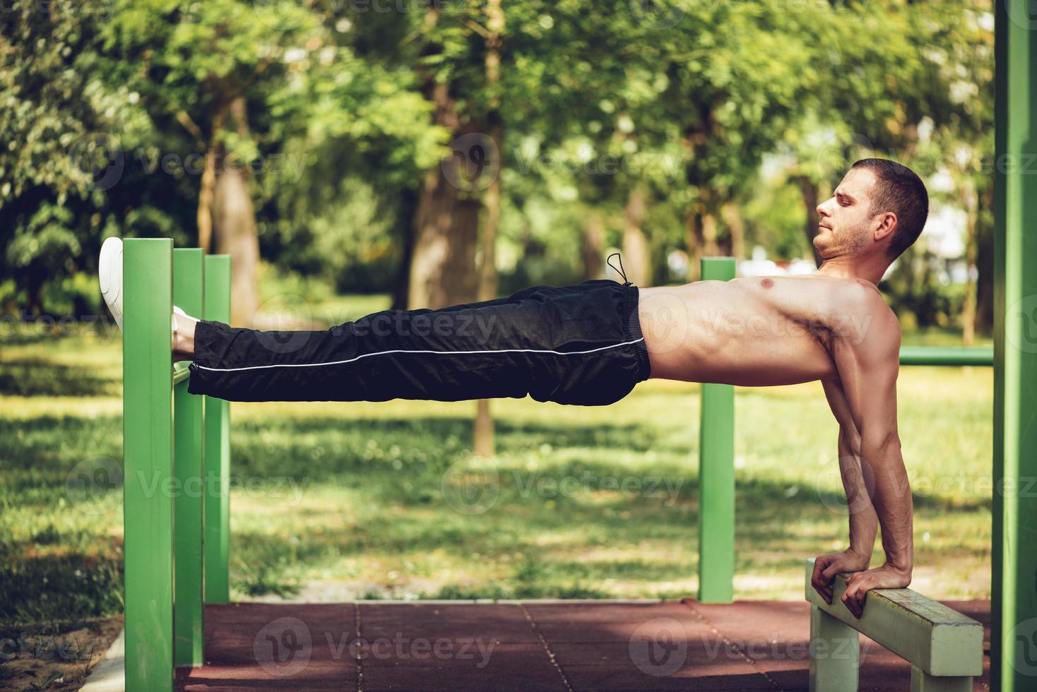Young Man Exercising In Nature photo