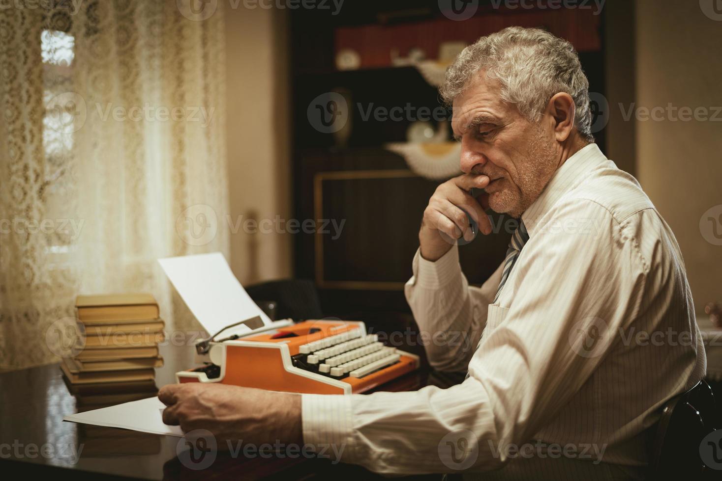Worried Retro Senior Man Writer photo