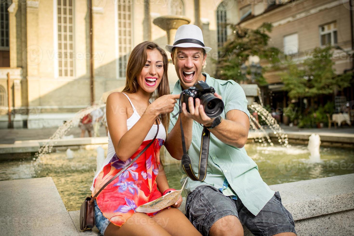 Happy Couple Of Tourists photo