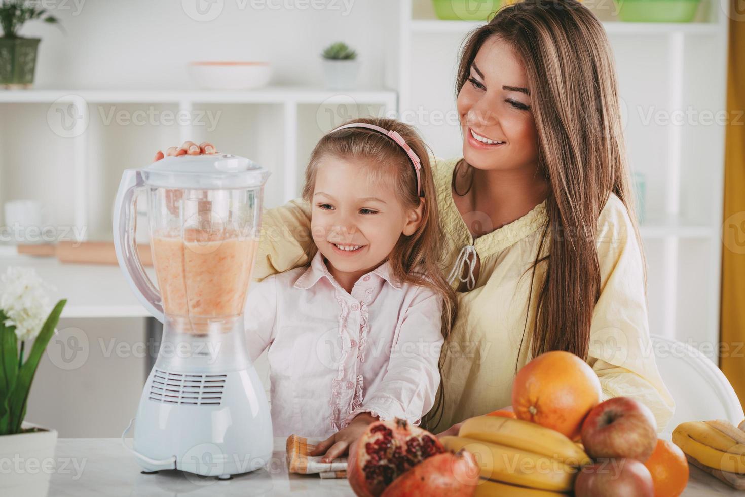 Mother And Daughter In The Kitchen photo