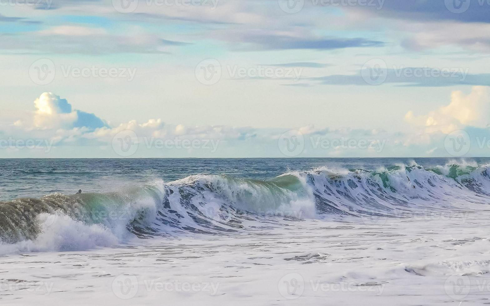 Extremely huge big surfer waves at beach Puerto Escondido Mexico. photo