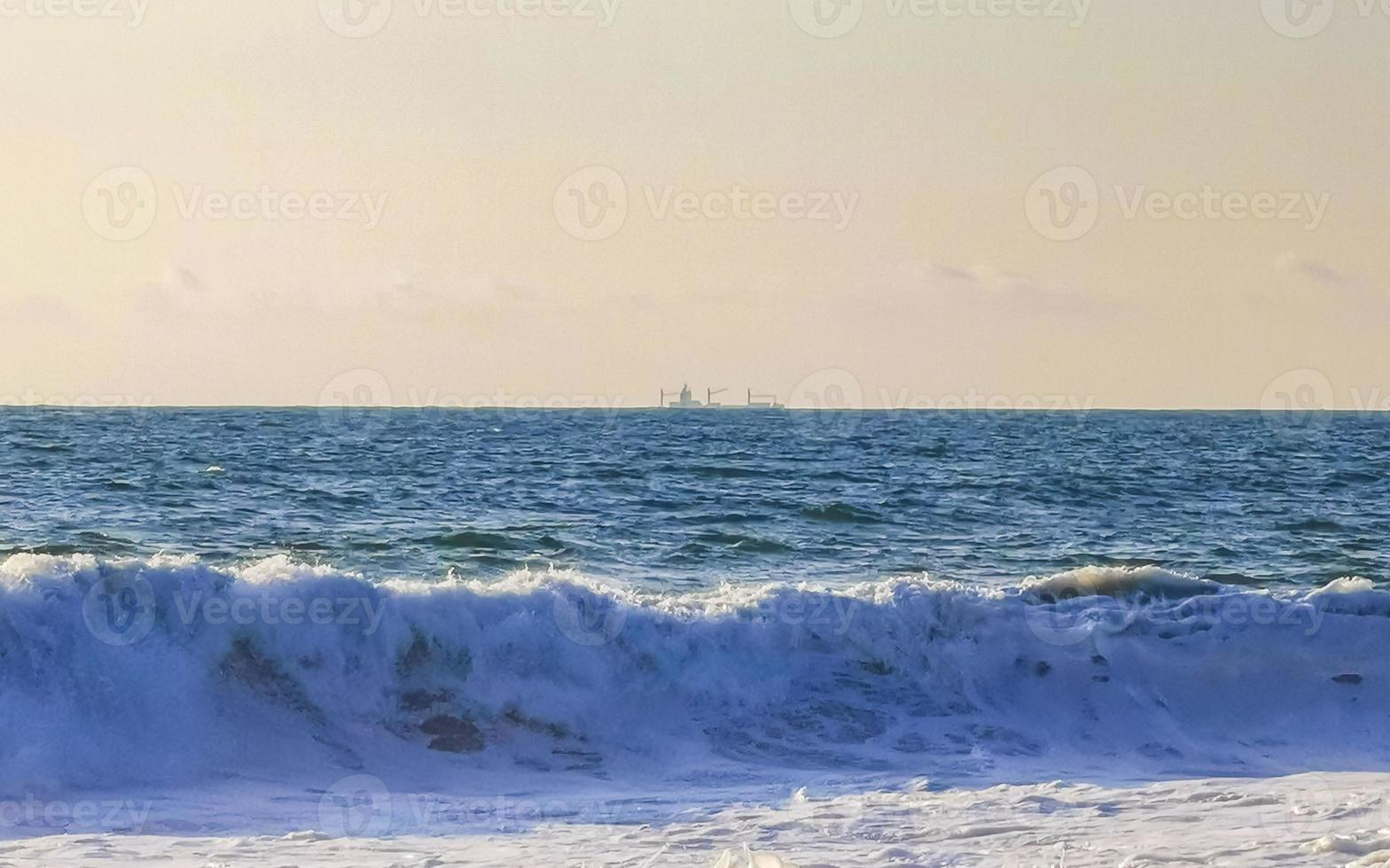 Extremely huge big surfer waves at beach Puerto Escondido Mexico. photo