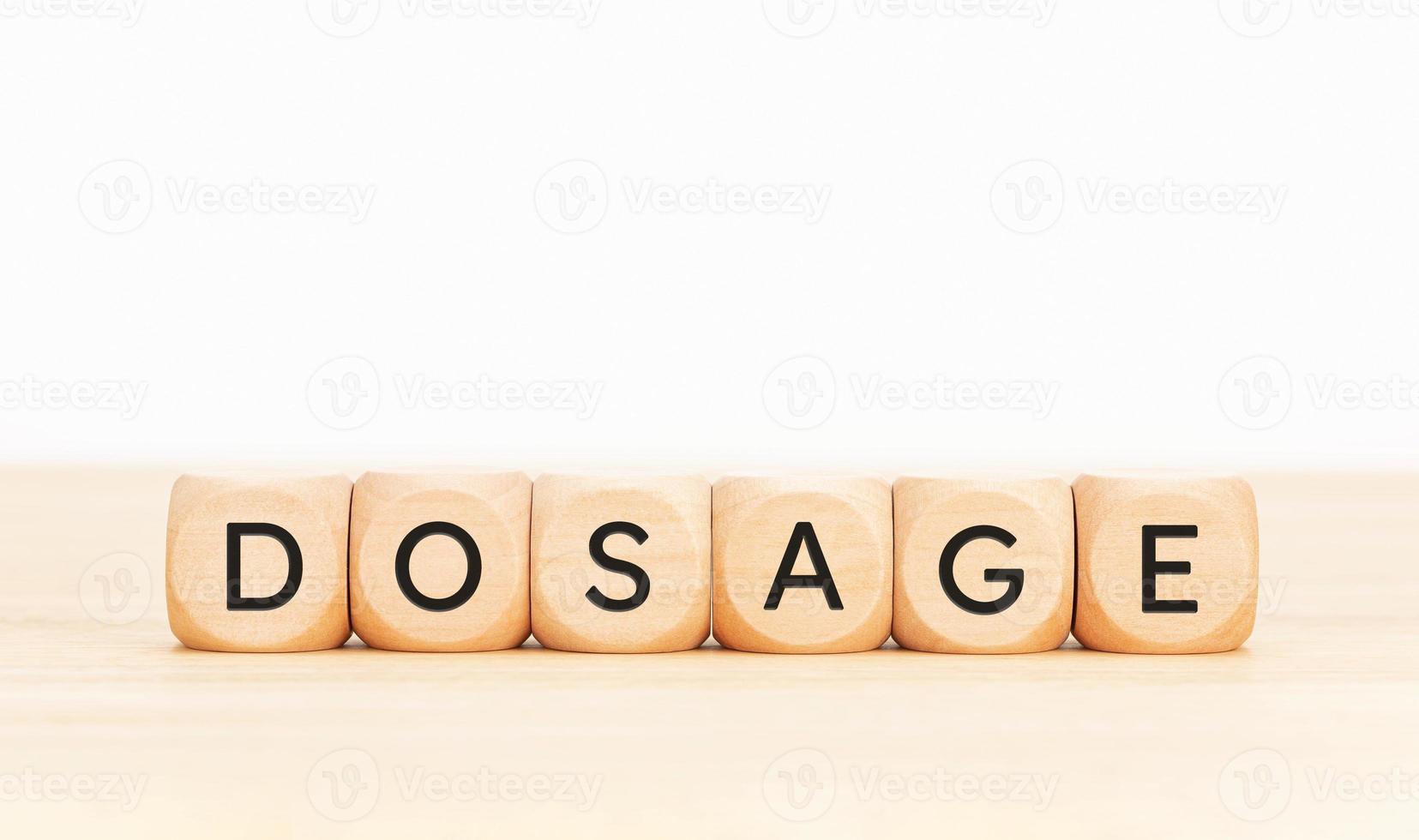 Dosage word on wooden blocks. Copy space photo